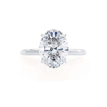 0.2 CT Oval Solitaire CVD E/VVS1 Diamond Engagement Ring